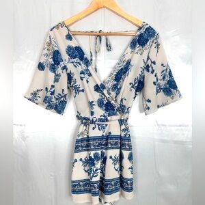 Floral Blue and White belted V neck and back lined romper size Small